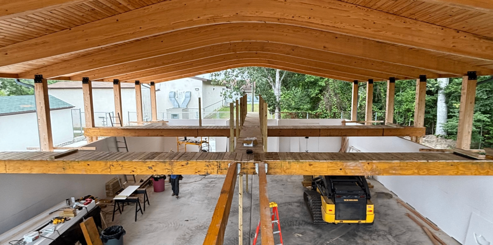 Interior framing view of the pavilion roof structure mid-build